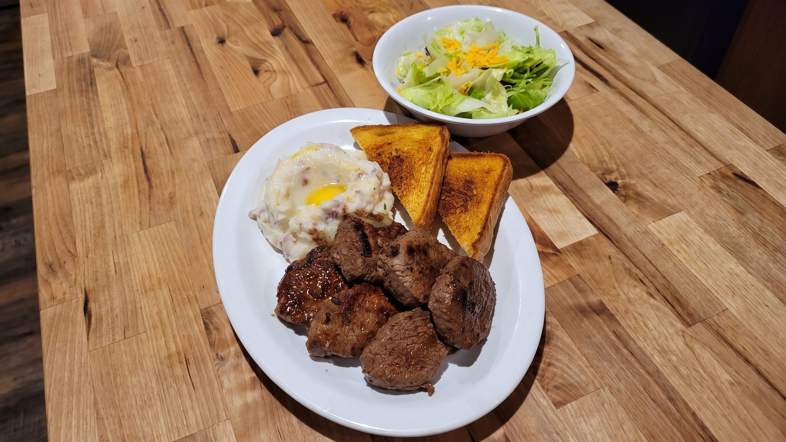 Bite Size Steak — Fresh mashed, garlic toast, soup or salad
